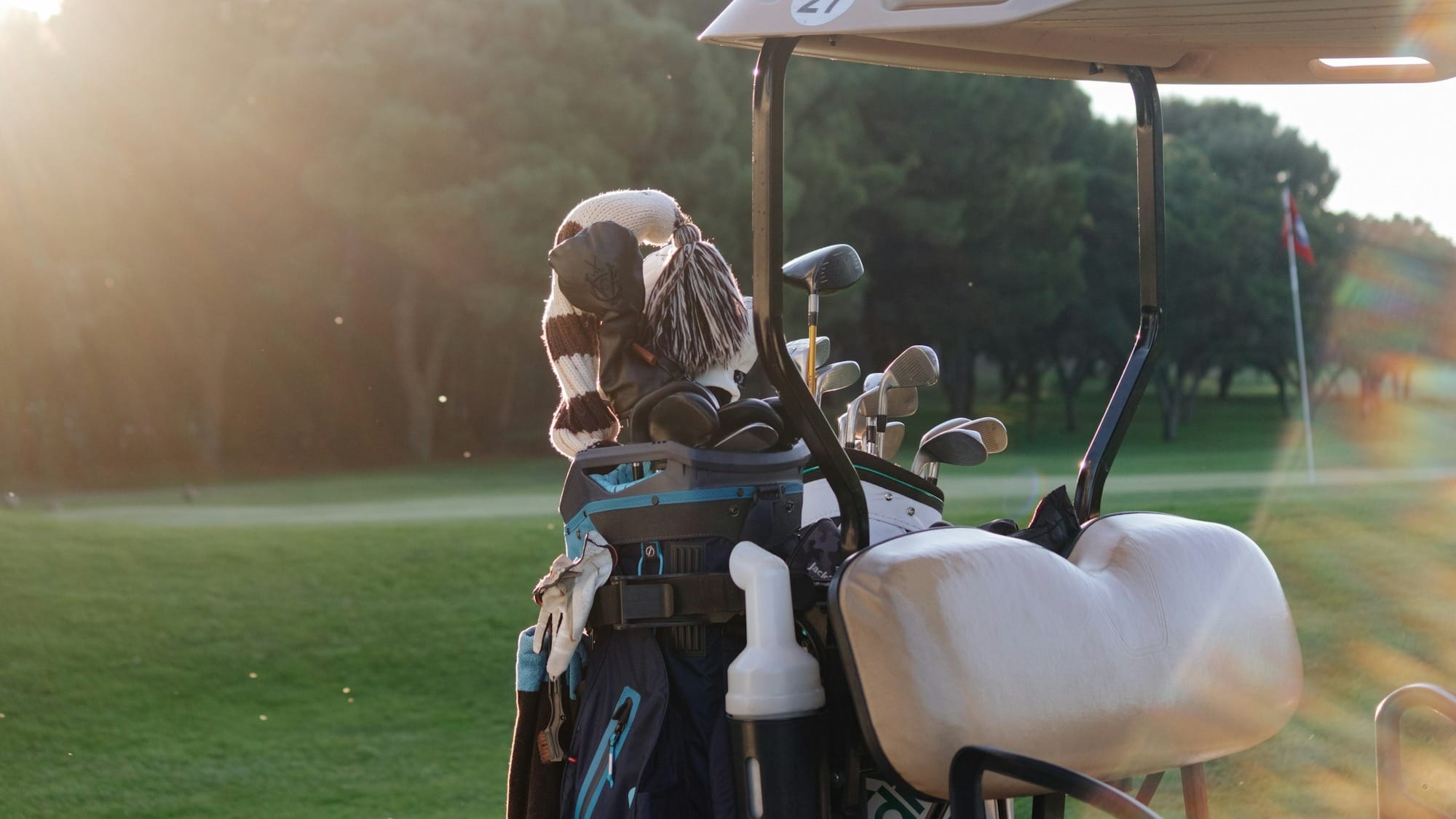 a golf cart with a bag of golf clubs